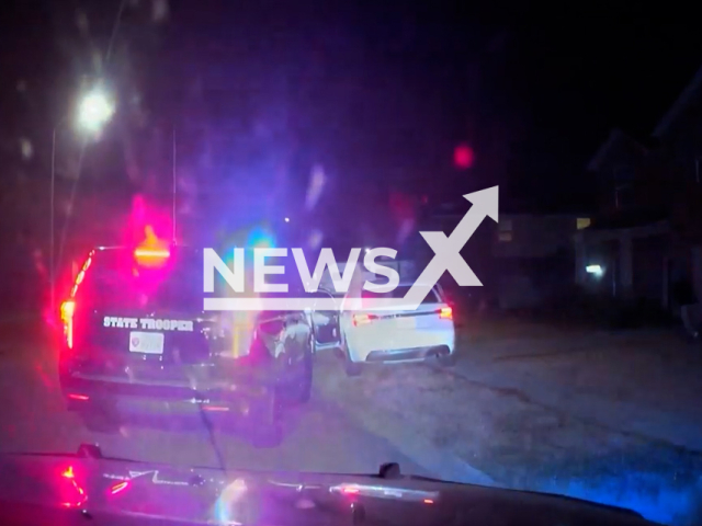 Police officers arrest two suspects after a chase in Chambers County, Texas, USA on Saturday, Jan. 7, 2023. Following the pursuit, the stolen vehicle was returned to the rightful owner. Note: Picture is a screenshot from a video. (Chambers County Sheriff's Office/Newsflash)