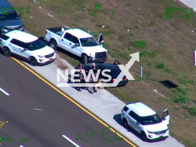 Police officers arrest the suspect, Patrick Schroeder wanted by police for aggravated assault in Florida, USA on Wednesday, Jan. 11, 2023. Schroeder was arrested for two counts of aggravated assault with a deadly weapon on LE, fleeing to elude LE, and resisting an officer. Note: Picture is a screenshot from a video. (Lee Sheriff/Newsflash)