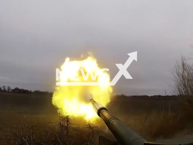 Russian tank shoots among trees in Ukraine in undated footage. The footage was released by the Russian Ministry of Defence on Monday, Jan. 16, 2023. Note: Picture is screenshot from a video.(@mod_russia/Newsflash)