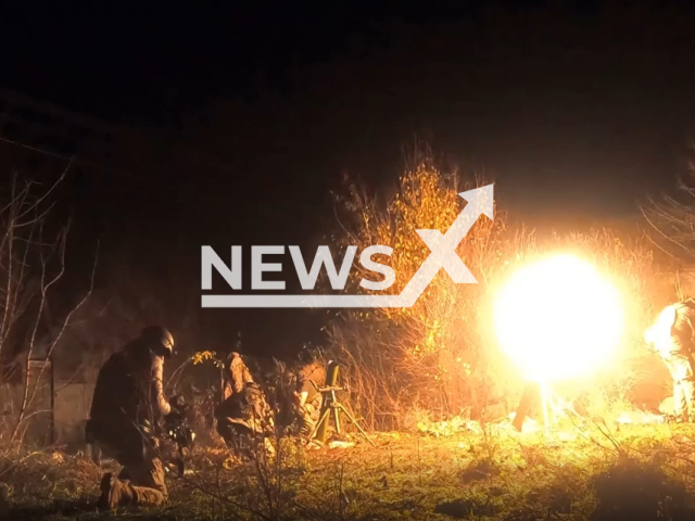 Description: Fighters of pro-Ukrainian the Kastuś Kalinoŭski Regiment formed from Belarusian volunteers shoot mortars at Russian army at night in Ukraine in undated footage. The footage was obtained from the Kastuś Kalinoŭski Regiment on Friday, Jan. 13, 2023. Notes: Photo is screen from a video.(@belwarriors/Newsflash)