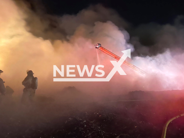 Firefighters battle a one-alarm fire near a scrap metal yard in New Orleans, Louisiana, USA on Friday, Dec 13, 2022.  Note: Picture from Fire Department. (Chief C Mickal, NOFD/Newsflash)