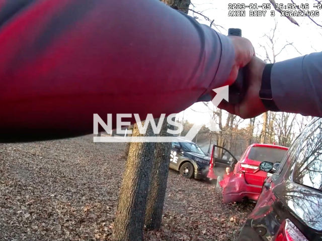 Police officer pointing a gun at the suspect before the arrest in Oklahoma City,  Oklahoma, USA on Thursday, Dec.5, 2023. The suspect was booked into Oklahoma County Detention Center on multiple complaints. 
Note: Picture is screenshot from a video.(Oklahoma City Police Department/Newsflash)