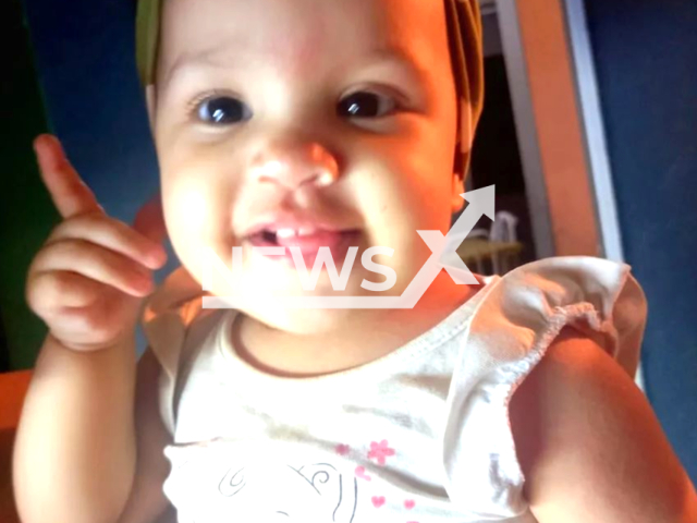 Samara Vitoria Amaro Ferreira Santana, one-year-old, poses in undated photo. She  died drowning in the pool at home in Cafelandia, Brazil,   on  Thursday, Jan. 12, 2023.
Note: Private photo.  (Newsflash)