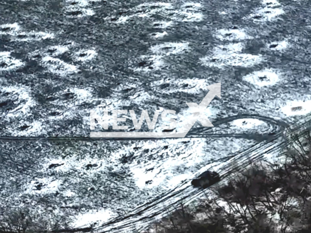 Description: Ukrainian tank moves down the road in a snowy field in Ukraine in undated footage. The footage was released by the separate brigade of territorial defense of the city of Dnipro on Sunday, Jan. 15, 2023. Notes: Photo is screen from a video.(@BrTODnipro/Newsflash)