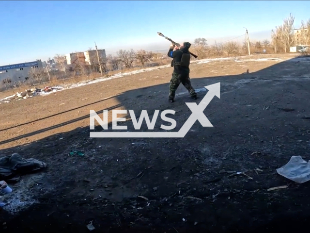 Ukrainian soldier shoots MANPADS at Russian troops in the battle for Soledar, Donetsk region, Ukraine in undated footage. The footage was released by the 46th brigade of the Ukrainian Air Assault Forces on Sunday, Jan. 15, 2023.Note: Picture is screenshot from a video. (@oaembr46/Newsflash)