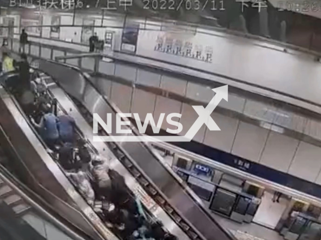 Around 30 passengers fall on each other because of subway escalator failure in Taipei, China. Note: This picture is a screenshot from the video (AsiaWire).