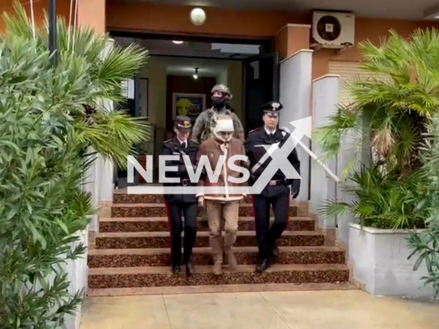 Officers arrest the mafia boss Messina Denaro in a private medical facility in Palermo, Italy, undated. Messina was the head of the infamous Cosa Nostra gang where he had the nickname 'The Devi because of a series of violent murders. Note: Picture is a screenshot from a video. (Weapon of the Carabinieri/Newsflash)