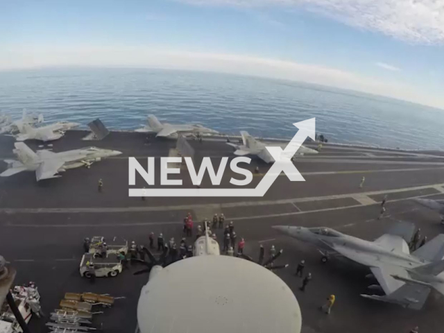 Description: The Nimitz-class aircraft carrier USS George H.W. Bush (CVN 77), conducts flight operations, on Saturday, Jan. 14, 2023. USS George H.W. Bush (CVN 77) is the tenth and final Nimitz-class supercarrier of the United States Navy. Notes: Picture is screen from a video.(U.S. Navy/Newsflash)