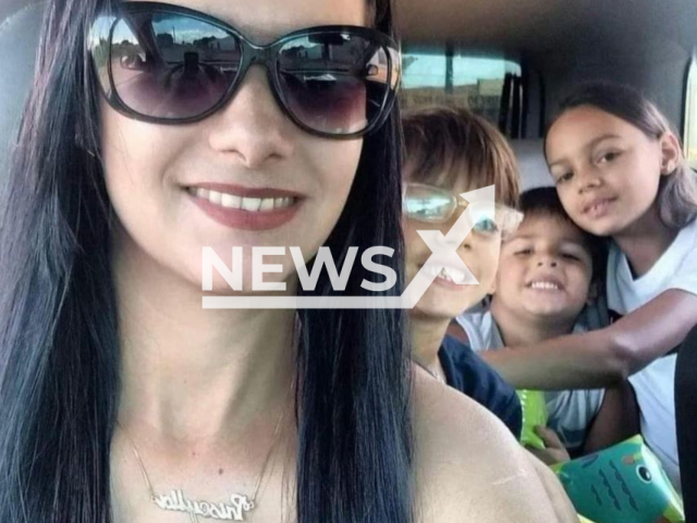 Victim Priscila Oliveira Franco Mafra, and her three children, aged 6, 8 and 13, pose in undated photo. They were   found dead on a  farm where they lived in Apore, Brazil, on Monday, Jan. 16, 2023, her husband who is the suspect  Fabio Jose Mafra de Oliveira, 43, committed suicide.
Note: Private photo.  (Newsflash)