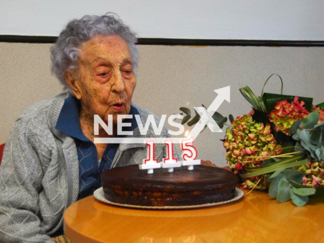 Spanish Maria Branyas, 115, blows out birthday candles in undated photo. She becomes the oldest person in the world when French nun Lucile Randon, aged 118, died in Toulon, France,  on Tuesday, Jan. 17, 2023.
 
Note: Private photo.  (@MariaBranyas112/Newsflash)