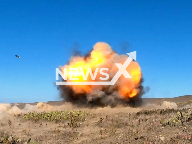 Picture shows an explosion in undated footage. The Independence-variant littoral combat ship USS Montgomery (LCS 8) struck the shore from the shoreline. Note: Photo is screenshot from a video. (U.S. Navy/Newsflash)