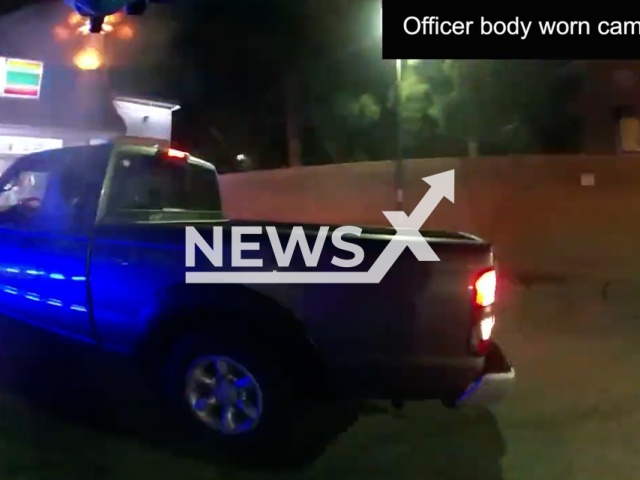 Description: Officer's body camera shows the suspect's truck in Mesa, Arizona, on Wednesday, Nov. 30, 2022. The 25-year-old suspect, Williams, was pronounced deceased at the scene. Notes: Picture is screen from a video.(The Mesa Police Department/Newsflash)