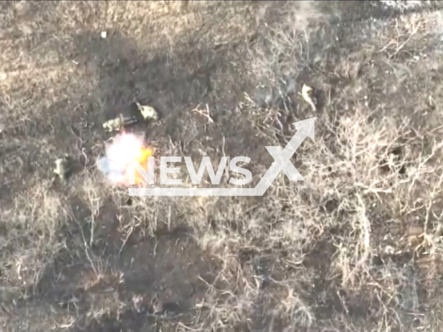 Picture shows an explosion near Russian occupiers in the field in Donetsk region, Ukraine in undated footage. The footage was released by the General Staff of the Ukrainian Joint Forces Task Force on Thursday, Jan. 19, 2023.  Note: Picture is screenshot from a video. (@easternforces/Newsflash)