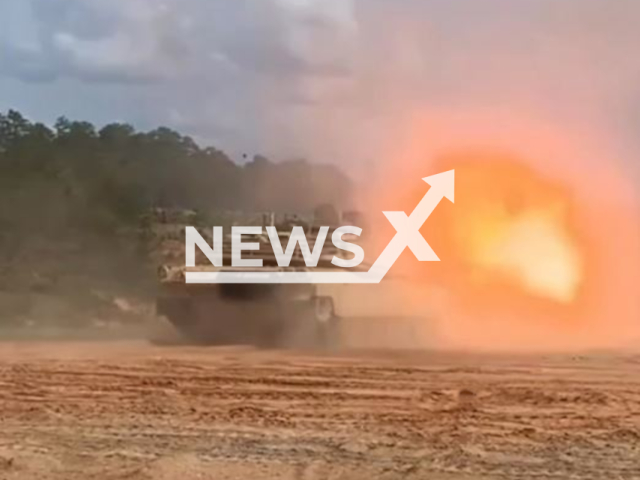 Picture shows a tank firing in undated footage. According to The U.S. Army, teaming Bradleys up with Abrams tanks for increased firepower and speed, the Army armored vehicles make a formidable team. Note: Picture is screenshot from a video. (The U.S. Army/Newsflash)