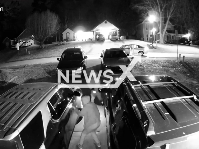 Two suspects attempt to steal parked cars, on Tuesday, Jan. 17, 2023. The suspects then fled the scene. Note: Picture is screenshot from video. (@ClaytonCountyPD/Newsflash)