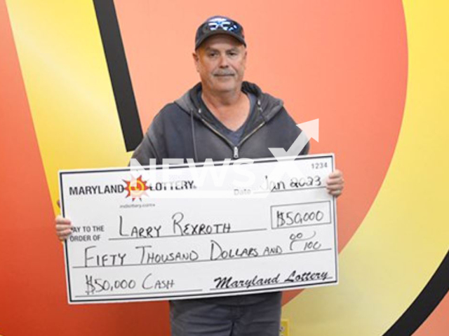 Larry Rexroth, 61,   poses with his lottery prize check, undated.  He decided to change his routine and  decided to buy the first scratch-off in the book , he won USD 50,000 top prize. Note: Licensed photo.  (Maryland Lottery/Newsflash)