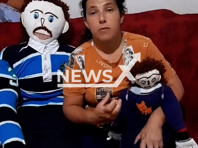 Brazilian Meirivone Rocha  poses with cloth doll Marcelo, holding their son Marcelinho da Santinha, a doll, undated.  She married the doll and  the couple had a child together. Note: Picture is screenshot from a video. (@meirivoneemarcelo/Newsflash)