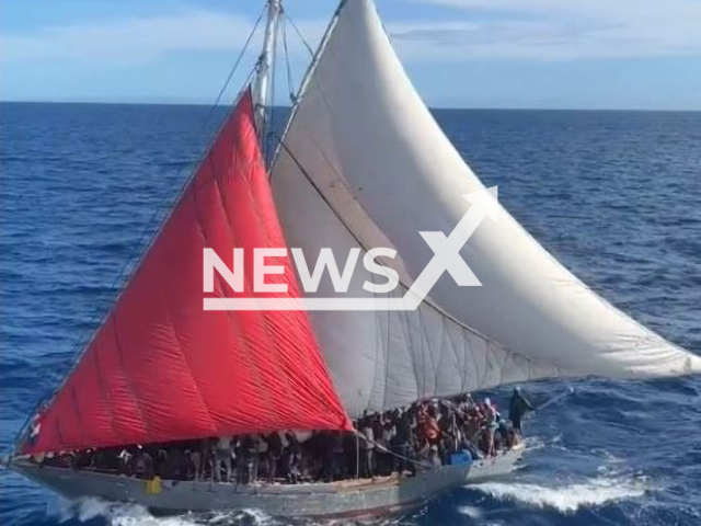 Unsafe and overloaded Haitian sail freighter floats approximately 60 miles south of Andros Island, Bahamas, on Saturday, Jan. 21, 2023. Coast Guard Cutter Legare's crew stopped the boat, and the people are scheduled to be transferred to Bahamian authorities. Note: Picture is screenshot from a video. (U.S. Coast Guard/Newsflash)