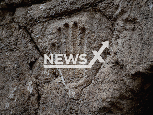 Photo shows the carved hand on the moat wall in the Old City of Jerusalem, Israel, undated. Archaeologists discovered the remains of a moat and a mysterious hand imprint outside the walls of Jerusalem’s Old City. Note: Licensed photo (Yoli Schwartz, Israel Antiquities Authority/Newsflash)