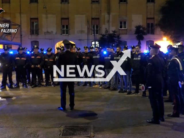 Police prepare to carry out a anti-mafia operation in  Palermo, Riesi and Rimini, Italy, on Jan. 24, 2023.
They carried out  precautionary measures against 7 people who were considered responsible for mafia-type associations and extortion  . Note: Picture is screenshot from a video. (Carabinieri Palermo/Newsflash)