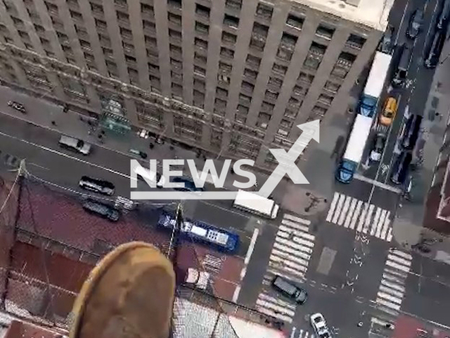 Picture shows the point of view of Harold R Legerme jr., a thirty-two-year-old union worker from Brooklyn, on top of the 13th floor of a building, in undated footage. Harold has had a hand in building many structures such as the George Washington Bridge, Madison Avenue Bridge, 270 Park Avenue, and more. Note: Picture is a screenshot from a video. (@blackherostatus/Newsflash)