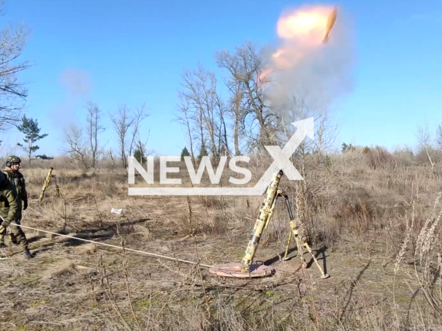 Russian soldiers fire from a mortar during training in the temporary occupied parts of Ukraine in undated footage. The footage released by the Russian MoD on Monday, Jan. 30, 2023.
Note: Picture is screenshot from video. (Ministry of Defense of Russia/Newsflash)