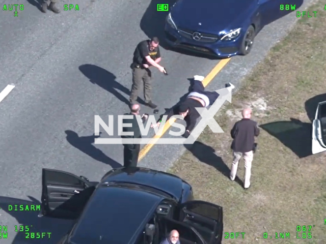 Deputies detain fleeing driver, Zachary Teytelbaum, in Flagler County, Florida, on Friday, Jan. 27, 2023. The suspect was charged with aggravated fleeing or attempting to elude law enforcement. Note: Picture is a screenshot from a video (@VolusiaSheriff/Newsflash)