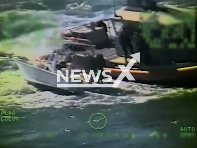 Coast Guard Station Gulfport rescues two boaters near the Chandeleur Island, Louisiana, on Saturday, Jan. 28, 2023. The two boaters aboard and transported to Bay of St. Louis, Mississippi. Note: Picture is screenshot from a video. (James Hague; U.S. Coast Guard/Newsflash)