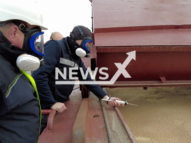 The picture shows officers inspecting the ship carrying grain from Ukraine to Afghanistan as part of the World Food Programme in Istanbul, Turkey on Friday, Jan. 27, 2023. Note: The picture is a screenshot from a video. (TR Ministry of National Defense/Newsflash)