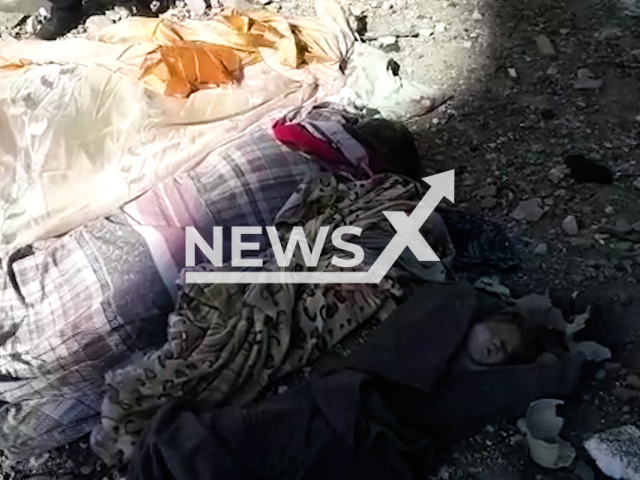 The bodies of the family were removed from the rubble of the dormitory among them are 3-year-old twins and a 12-year-old girl in Chernihiv in Ukraine.
Note: This picture is a screenshot from the video.
(@MNS.GOV.UA/Newsflash)