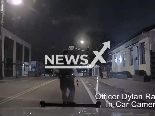 Nashville police officer, Dylan Ramos, approaches an armed 47-year-old man in North Nashville, on Sunday, Jan. 29, 2023. The officer fatally shot the suspect. Note: Picture is a screenshot from a video (@metropolitannashvillepolic9544/Newsflash)