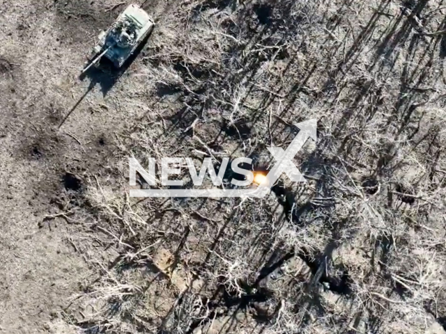 Ukrainian fighters drop bombs on the Russian soldiers in the trenches in Ukraine in undated footage. The footage released by the 68th separate hunting brigade on Wednesday, Feb. 01, 2023.Note: Picture is screenshot from a video. (@68brigade/Newsflash)