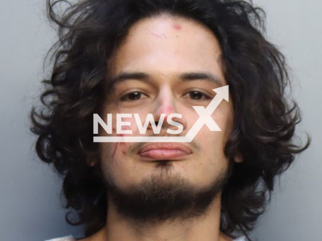 Kevin Mayorga, 32, poses in an undated photo. Kevin bit off a pet python snake's head in domestic dispute. Note: Photo from police. (Miami-Dade Police Department/Newsflash)