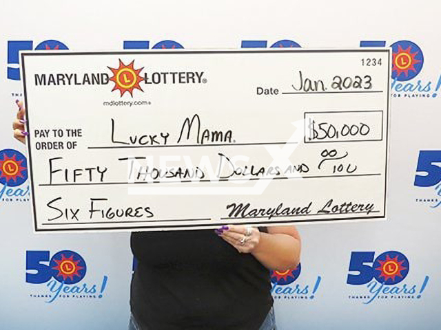 Mother of four from Montogomery County poses with her lottery cheque in Maryland, in January 2023. The woman nicknamed herself "Lucky Mama". Note: Photo from Maryland Lottery. (Maryland Lottery/Newsflash)