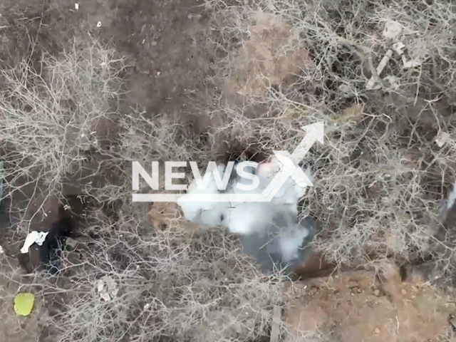 Picture shows an explosion of Russian foxhole with ammunition in Ukraine in undated footage. The footage was released by the Zaporizhzhia separate territorial defense brigade on Thursday, Feb. 2, 2023. Note: Picture is screenshot from a video. (@110tro/Newsflash)