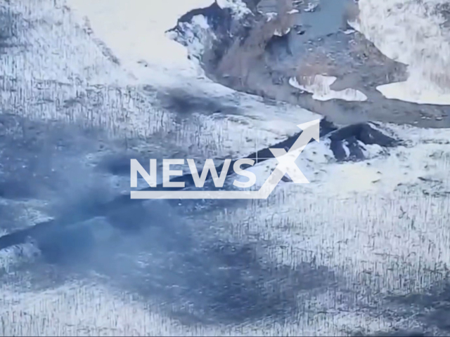 Russian troops move in a snowy trench in Ukraine in undated footage. The footage was released by the Poltava Separate Territorial Defense Brigade on Thursday, Feb. 2, 2023. Note: Picture is a screenshot from a video (@brygada_TrO_Poltava/Newsflash)