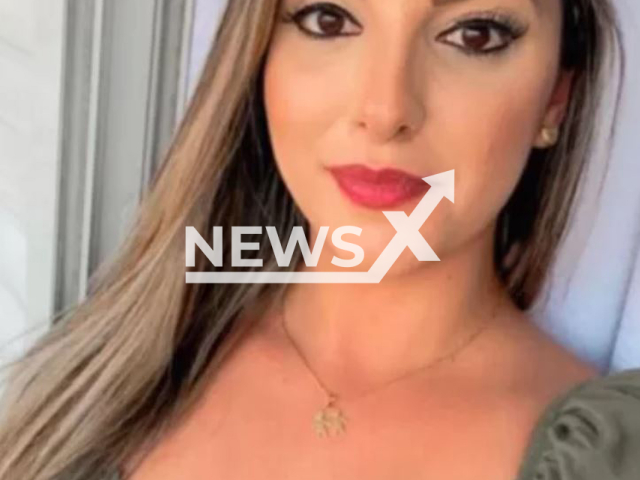 Juliana Guerreiro, 34  poses in undated. She was abused by her husband Ricardo Guerreiro, 46, and she filmed her own rape and posted in on social media with other eveidence of the abuse.  
Note: Private photo. (Newsflash)