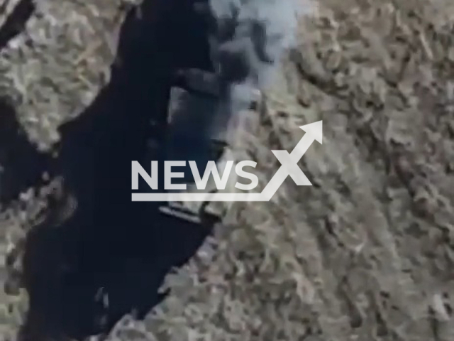 Ukrainian fighters destroy a Russian excavator while digging trenches in Ukraine in undated footage. The footage was released by the Ground forces of the Armed Forces on Tuesday, Feb. 7, 2023. Note: Picture is a screenshot from a video (@110separatebrigade/Newsflash)