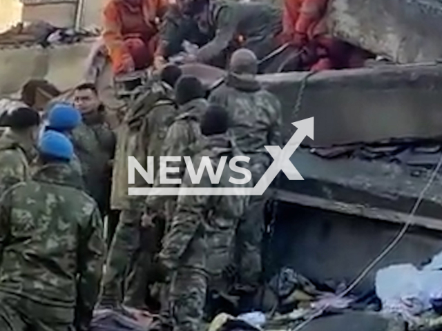 Natural Disaster Search and Rescue Battalion rescue a man named Buse from under the rubble in Hatay, Turkey, in undated footage. Thousands of people have been left injured as a result of the earthquakes in Turkey. Note: Picture is screenshot from a video. (@tcsavunma/Newsflash)