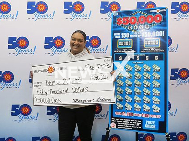 Denise McIntosh poses with her lottery cheque in an undated photo. Denise won a $50,000 scratch-off prize. Note: Photo from Maryland Lottery. (Maryland Lottery/Newsflash)