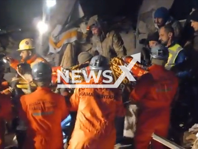 Soldiers rescue a woman under the rubble in Hatay, Turkey, undated. Thousands of people died and were injured as a result of a massive earthquake in Turkey, Monday, Feb. 6, 2023. Note: Picture is a screenshot from a video (@tcsavunma/Newsflash)