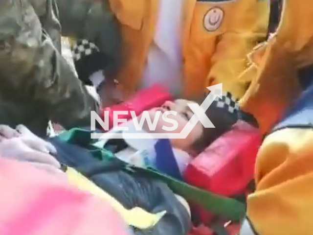 Soldiers rescue Kubra Ecrin Kilinc under the rubble in Adiyaman, Turkey, undated. Thousands of people died and were injured as a result of a massive earthquake in Turkey, Monday, Feb. 6, 2023. Note: Picture is a screenshot from a video (@tcsavunma/Newsflash)