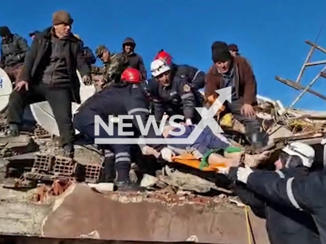 Emergency services rescue a man in undated footage. Thousands of people have been left injured as a result of the earthquakes. Note: Picture is a screenshot from a video (Ministry of Emergency Situations/Newsflash)