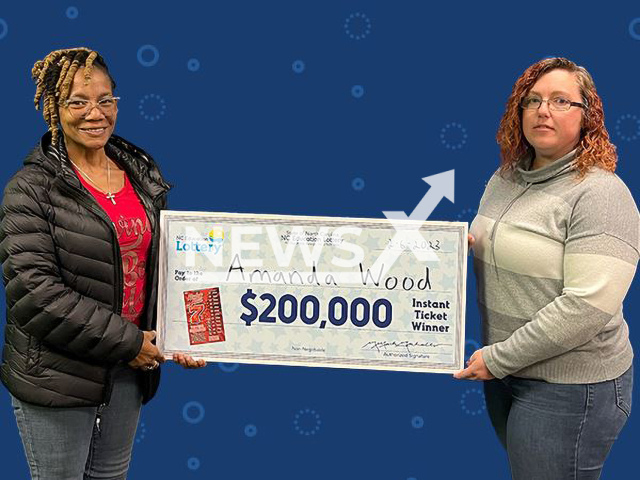 Amanda Wood (right) from the city of Concord, North Carolina, USA, poses with her mother-in-law, in undated photo. She collected a USD 200,000 (GBP 165,478) lottery prize on Monday, Feb. 6, 2023. Note: Licensed content. (North Carolina Education Lottery/Newsflash)