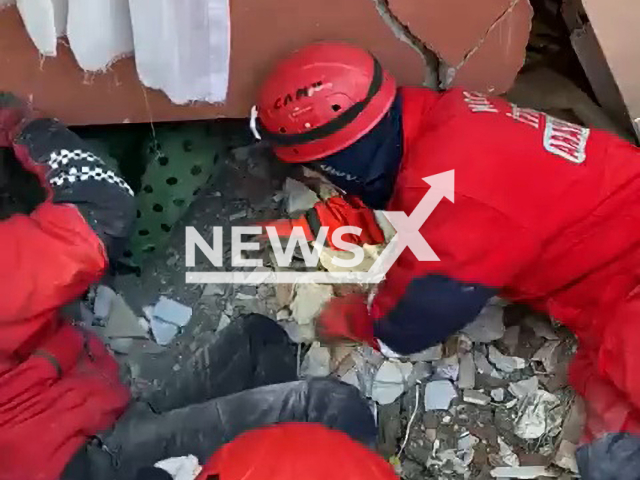 Rescuers pull out Semra Et from under rubble in Hatay, Turkey, Wednesday, Feb. 8, 2023. Thousands of people died and were injured as a result of a massive earthquake in Turkey, Monday, Feb. 6, 2023. Note: Picture is a screenshot from a video (@kocaelibld/Newsflash)