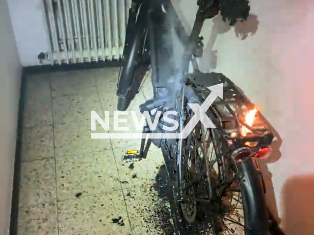 Electric bike catches fire in Denzlingen, Germany, on Thursday, Feb. 2, 2023. Rescue workers were quickly on site and the burning bike was carried out. Note: Picture is a screenshot from a video (@PolizeiFreiburg/Newsflash)