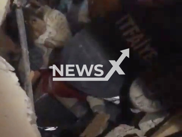 Rescuers pull out a baby girl under the rubble in Hatay, Turkey, Wednesday, Feb. 8, 2023. Thousands of people died and were injured as a result of a massive earthquake in Turkey, Monday, Feb. 6, 2023. Note: Picture is a screenshot from a video (@mansuryavas06/Newsflash)