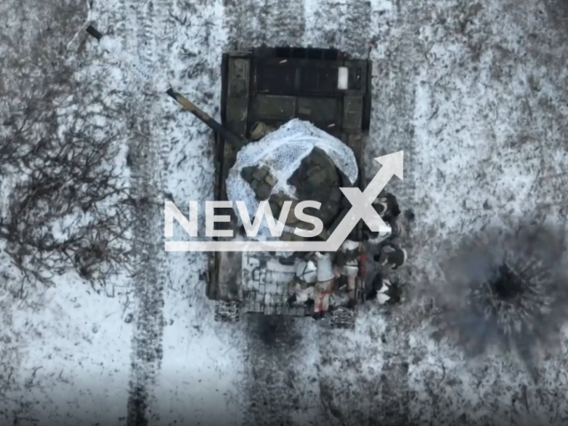 Ukrainian marines drone bomb explodes near Russian soldiers and their tank in Donetsk region, Ukraine in undated footage. The footage was released by the 36th brigade of the Ukrainian Navy on Thursday, Feb. 9, 2023. Note: Picture is a screenshot from a video (501 battalion/Newsflash)