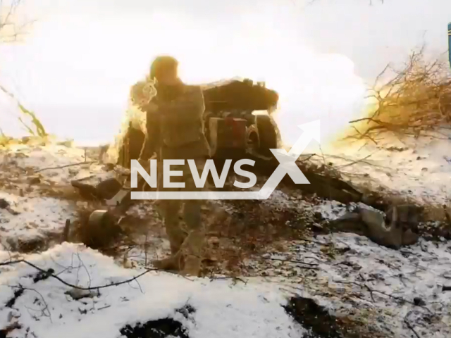 Ukrainian soldier shoots at Russian positions using Rapira MT-12 anti-tank gun in Ukraine in undated footage. The footage was released by the 35th brigade of the Ukrainian Navy on Thursday, Feb. 9, 2023.Note: Picture is a screenshot from a video. (@35obrmp/Newsflash)