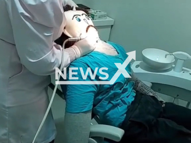 Marcelo the doll goes to the dentist, undated. Meirivone Rocha married  Marcelo, her doll partner in Alto Parana, Brazil, on 18th December. 
Note: Picture is a screenshot from a video (@meirivoneemarcelo/Newsflash)